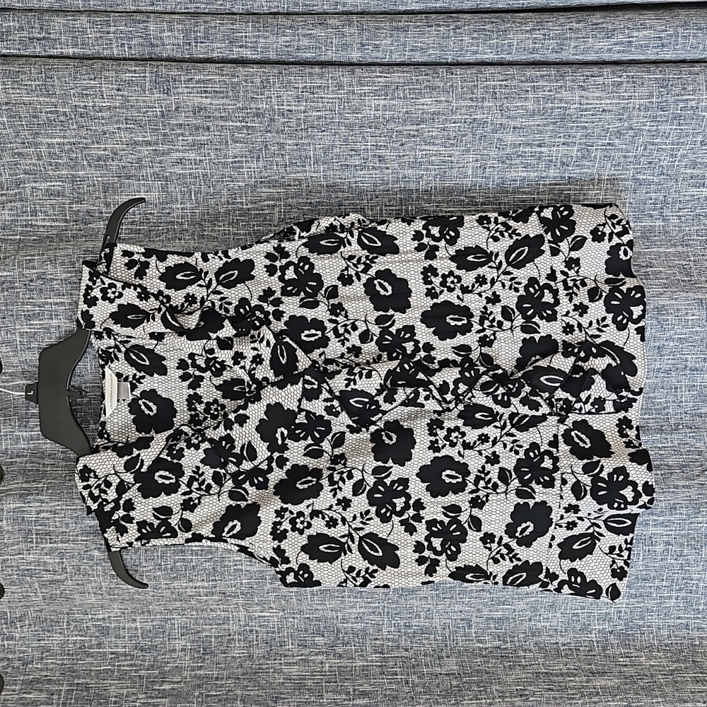 Black and white dressy sleeveless blouse